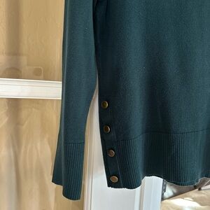 Stretch quarter length sleeve sweater with button detail